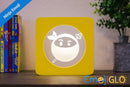 Laughing EmojiGLO - Emoji based 2D LED Light in iconic Emoji Yellow/Red wood frame with interchangeable emojis